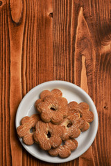 Homemade pastry concept. Tea cookies on wooden background