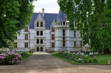 Fototapeta na wymiar June 29, 2017 6:00 pm Château d'Azay-le-Rideau, Loire Valley, France. The castle of Azay-le-Rideau is a so-called castle of water: surrounded and protected in access by a network of water channels.