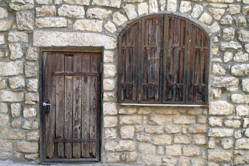 Fototapeta na wymiar Old wooden door in a medieval building