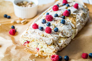 Meringue Almond Roll with Berries, Cream and Lemon Curd