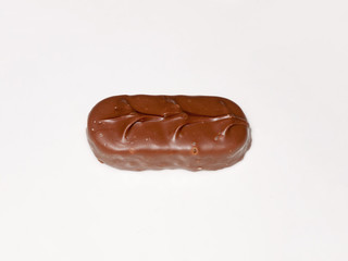 brown chocolate bounty bar on white surface sweets food