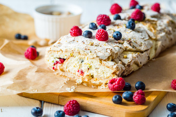 Meringue Almond Roll with Berries, Cream and Lemon Curd