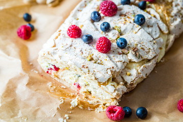 Meringue Almond Roll with Berries, Cream and Lemon Curd