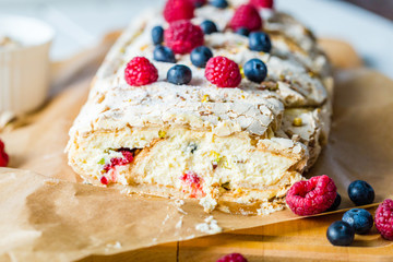 Meringue Almond Roll with Berries, Cream and Lemon Curd