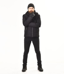 Tough confident stylish punker in black hooded jacket