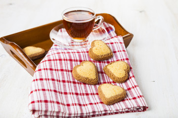 Heart-shaped cookies and tea