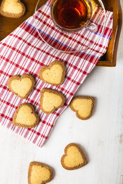 Heart-shaped cookies and tea