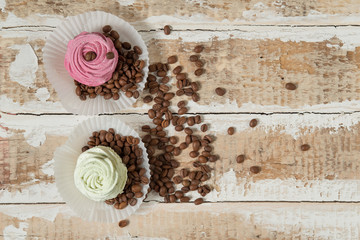 homemade marshmallow cake with currant, mint and Apple addition preparations and coffee beans on a rough wooden surface