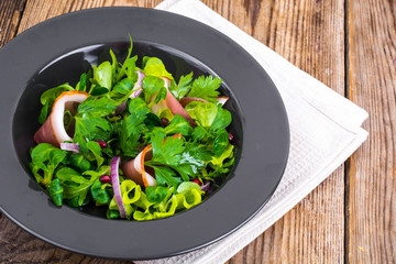 Mixt of lettuce leaves with Parma ham