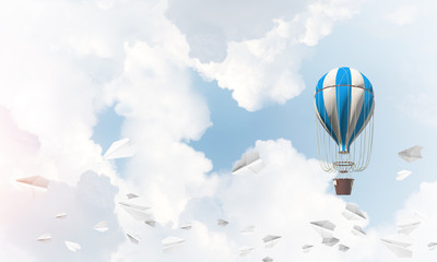 Flying hot air balloon in the air.