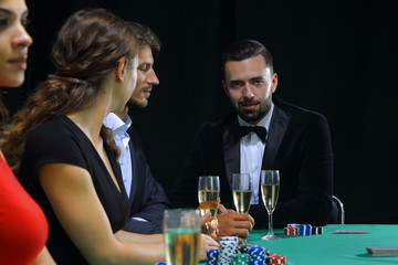 brunette girl in the casino playing poker