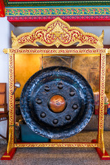 Naklejka premium old gong in the temple of Bangkok closeup