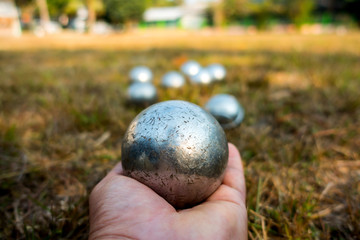 petanque ball. people at sport playing game petanque.