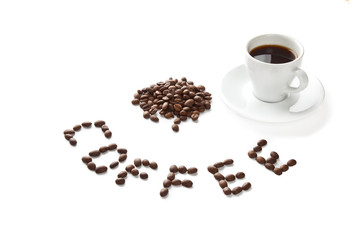 A cup of coffee and seeds isolated