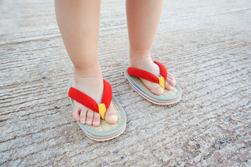 Close up of girl wearing Japanese sandals.