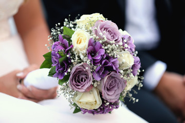 Bride&Groom holding wedding bouquet