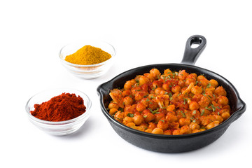 Fried spicy chickpeas in frying pan isolated on white background

