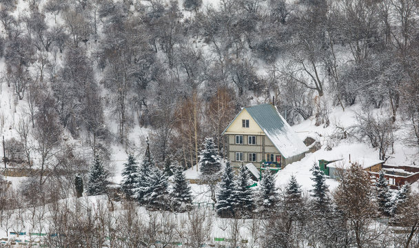 cottage in the snowy mountains