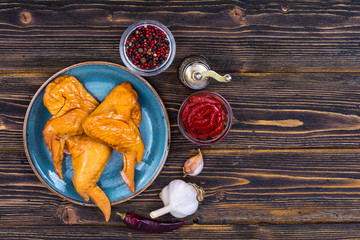 Plate with smoked chicken wings