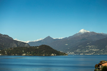 Scenic view of Como lake with Alps mountains in background.