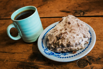 Cup of coffee with dessert on the table