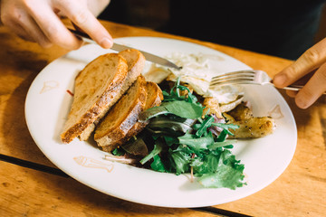 Healthy breakfast with greens and toasts
