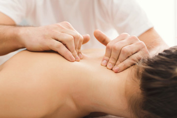 Fototapeta premium Woman getting classical back and neck massage