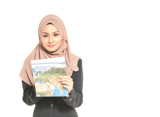 Hijab teenager hold a map. Trave; concept.