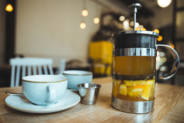 comfy cafe couple cups and french press with tea