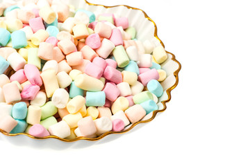 Sweet tasty colored marshmallow mini on white