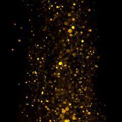 Abstract golden shiny glitter bokeh lights background