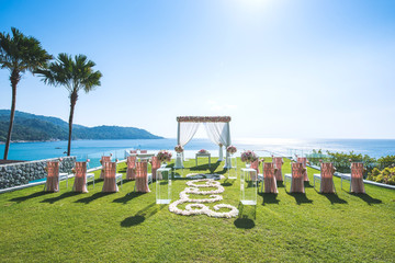 Romantic wedding on the rooftop of the hotel lawn Sea view. - 191370526