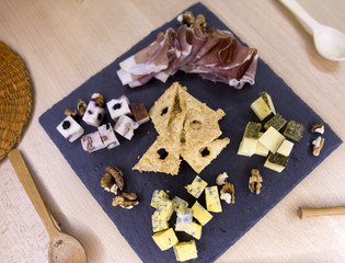 Different kind of cheese , jamon
