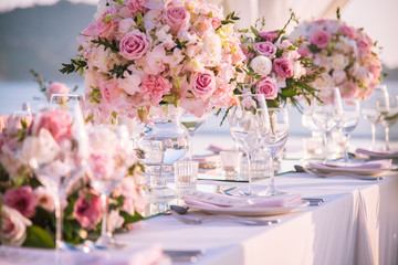 Table setting at a luxury wedding and Beautiful flowers on the table. - 191371126
