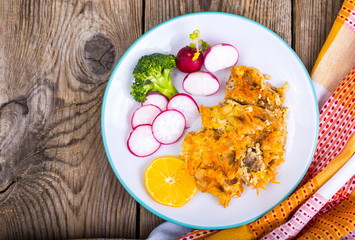 Healthy eating. Fish with stewed and fresh vegetables