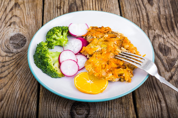 Healthy eating. Fish with stewed and fresh vegetables
