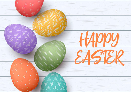 Happy Easter. Festive easter white wooden background. Easter colorful eggs in vertical line