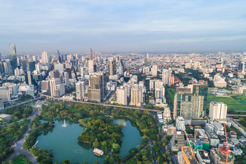 Modern city downtown of Bangkok with green public park