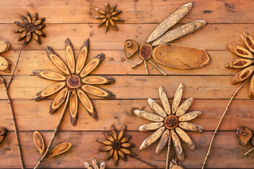 honey production concept, wooden representation of bee and flowers