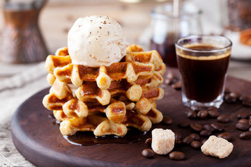 Fresh whole wheat waffles, ice cream, maple syrup