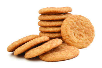 Stack of snickerdoodles over white.