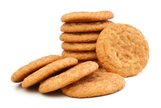 Stack of snickerdoodles over white.