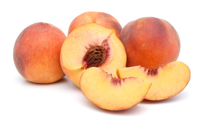 sweet peaches on a white background