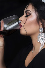 Beautiful woman drinking wine