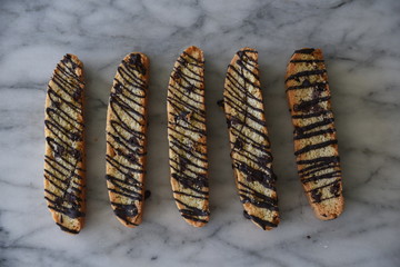 Chocolate biscotti in a row, elevated view