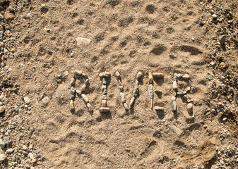 River on beach with rocks