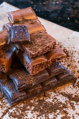 Chocolate bars on dark background