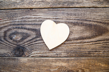 white heart on a wooden background