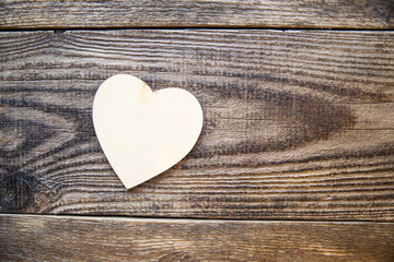 white heart on a wooden background