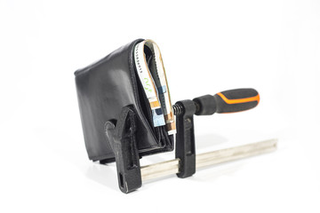 Abstract photo. Purse under clamp.